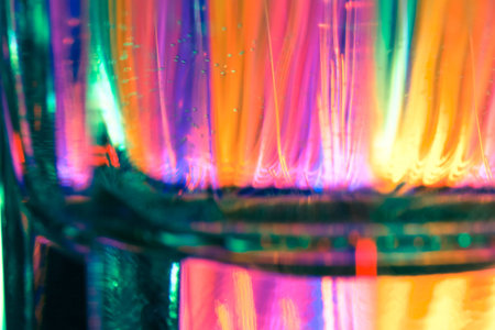 A glass in the colorful nightの写真素材