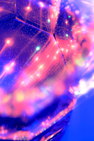 A glass in the colorful nightの写真素材