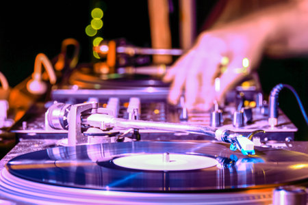 dj at work on the playerの写真素材