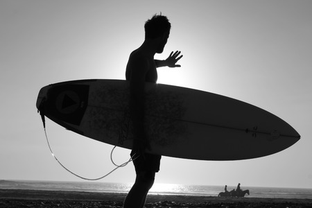 A shadow of a man in the sunsetの写真素材