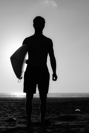 A shadow of a man in the sunsetの写真素材
