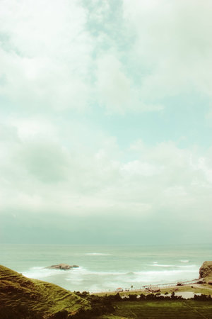 a beach of the ocean on a hot summer dayの写真素材