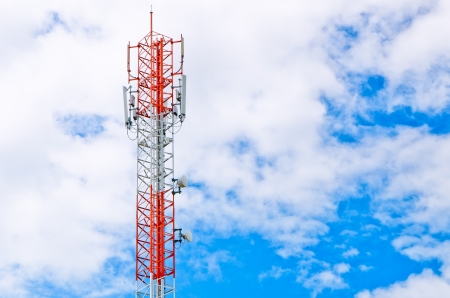 Communication tower over a blue sky background