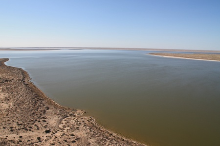A Usually-Dry Desert Creek in Flood, heading towards Lake Eyre