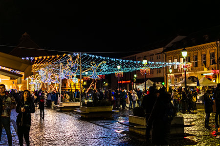 Rasnov Town Square Winter Celebration and Christmas Market at Nightのeditorial素材