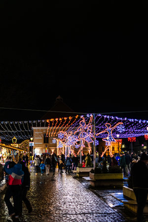 Rasnov Town Square Winter Celebration and Christmas Market at Nightのeditorial素材