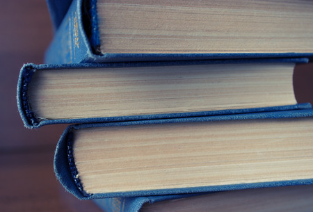 stack of books on the wooden tableの写真素材