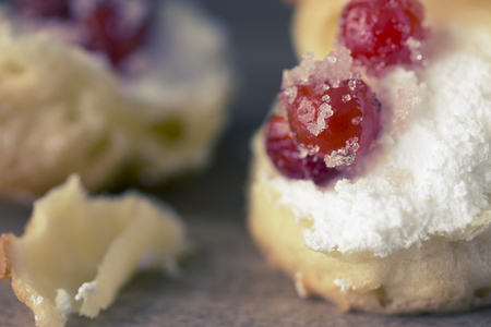 Choux Cream Stuffed With Custard Cream with berriesの写真素材