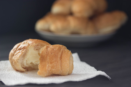 french tasty, fresh croissans on dark background