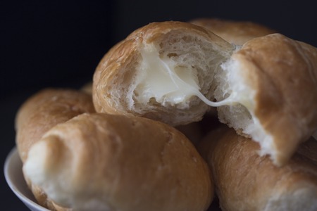 french tasty, fresh croissans on dark background
