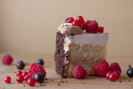 peace of cake decorated with fresh berriesの写真素材