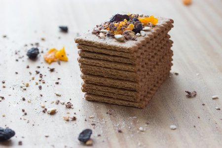 cookies with dry fruits on wooden tableの写真素材