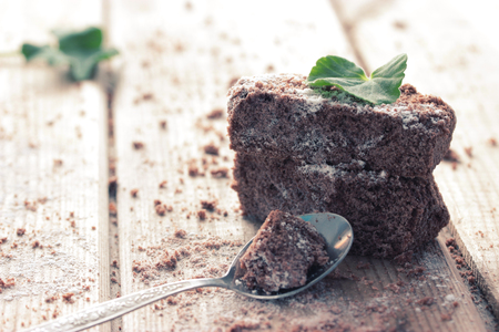 chocolate brownie and mint on wooden tableの写真素材