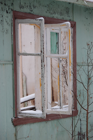window in the abandoned house close upの写真素材