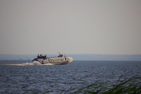 motorboat with waves on the sea, sunny summer dayの写真素材
