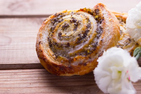 cookie with poppy seeds and white flowersの写真素材