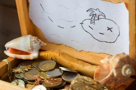 Treasure chest, old coins and treasure mapの写真素材