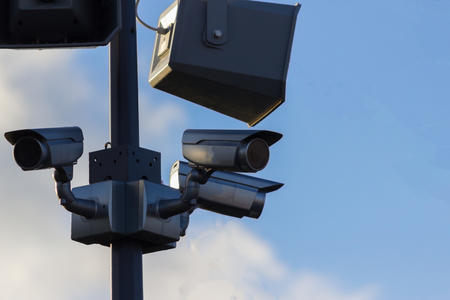 Urban security video camera outdoors at a park