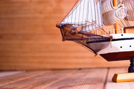 model of ships on the wooden table. travel conceptの写真素材