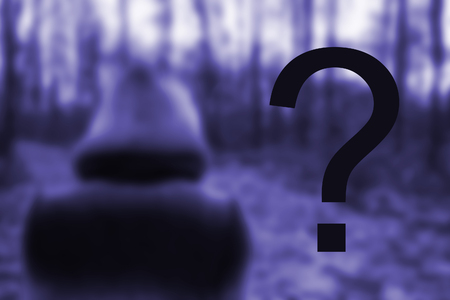 woman in a hood. mystic forest background. hallooweenの写真素材