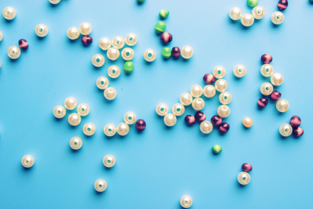Beads Background. Retro Top View Colorful Bead Heap. blue backgroundの写真素材