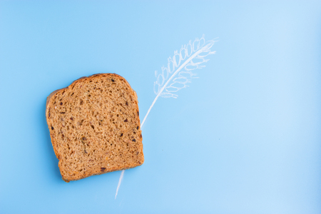 whole grain bread. piece of bread and earsの写真素材