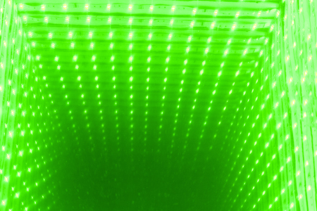 Multicolored defocused bokeh lights background. illuminated tableの写真素材