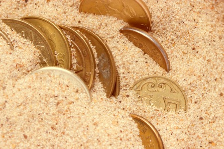 Old treasure in sand. treasure chest conceptの写真素材