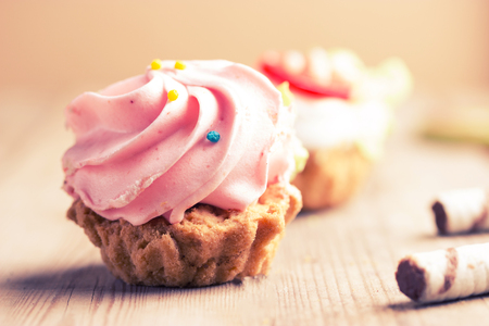 sweet pink cupcake. close up. toned imageの写真素材