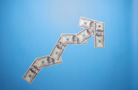 hungred Dollar up arrow over blue background