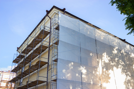 old Building facade renovation, house reconstruction, repair.の写真素材