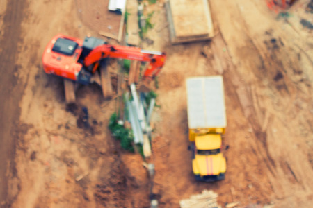 Blurred crane and building construction site as background. top viewの写真素材