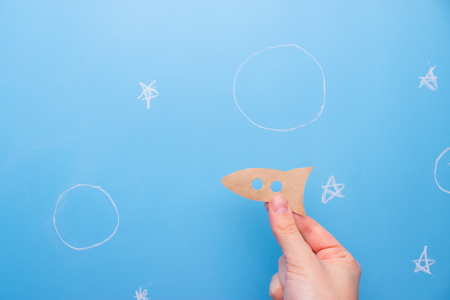 rocket fly in the sky. paper rocket and drawning skyの写真素材