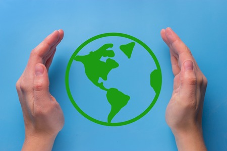 Green planet in your heart hands - usa - environment conceptの写真素材