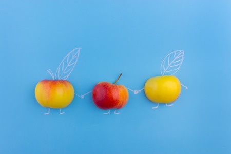 Face on an apples. funny apple familyの写真素材