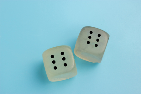 risk concept - playing dice at blue background. winの写真素材