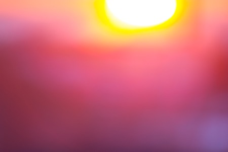 Yellow background concept: Sun light with blur beautiful nature autumn sunrise.の写真素材