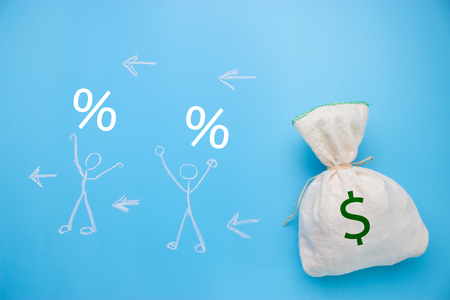 people take money from the big bag. expences conceptの写真素材