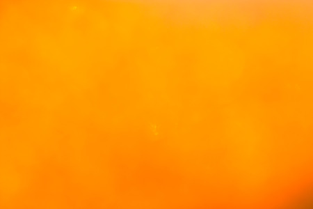 Bokeh backgrounds : orange color. warm and sunny colorの写真素材