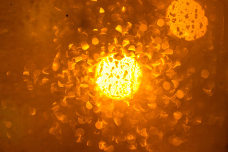 Abstract lights, flash , night city. rain dropsの写真素材