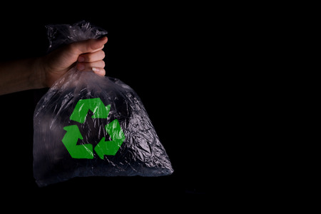 Plastic recycled with a recycling logo.