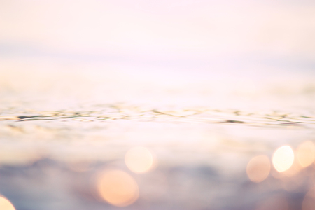 Blur tropical sunset beach. blurred water backgroundの写真素材