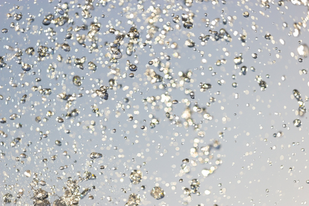 Waves splash, close up. blurred water splashesの写真素材