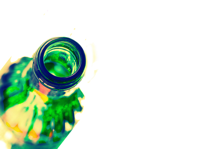 green bottle with alcohol on light backgroundの写真素材