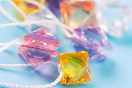 colorful jewellery on the blue background.