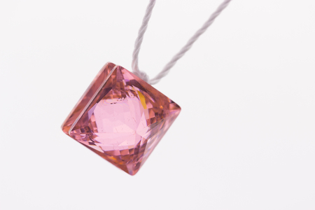 colorful glass pendants on light background.の写真素材