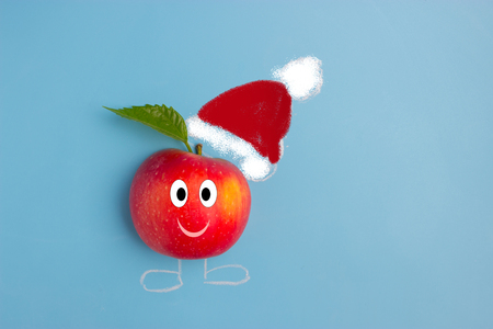 apple in a christmas hat.の写真素材
