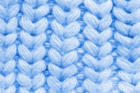 Macro of a woolen Pattern - Knitting Pattern with Purls and Knits. blue color