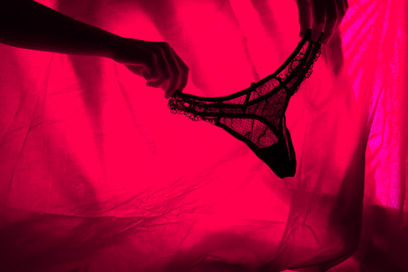 sexy woman underwear in red light. sex conceptの写真素材