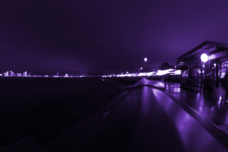 toned image of night city. violet colorの写真素材